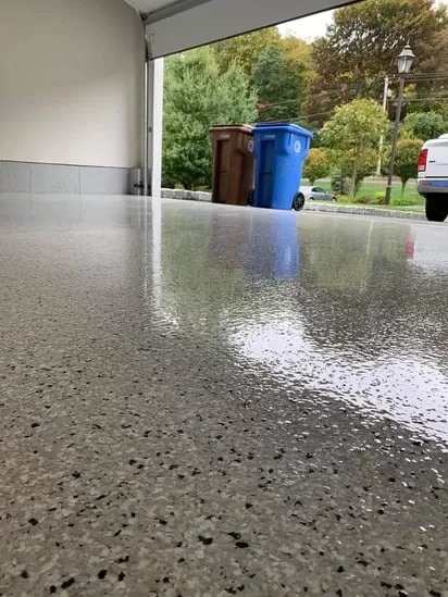 Epoxy Garage Coating close-up showing the reflective surface and decorative flakes